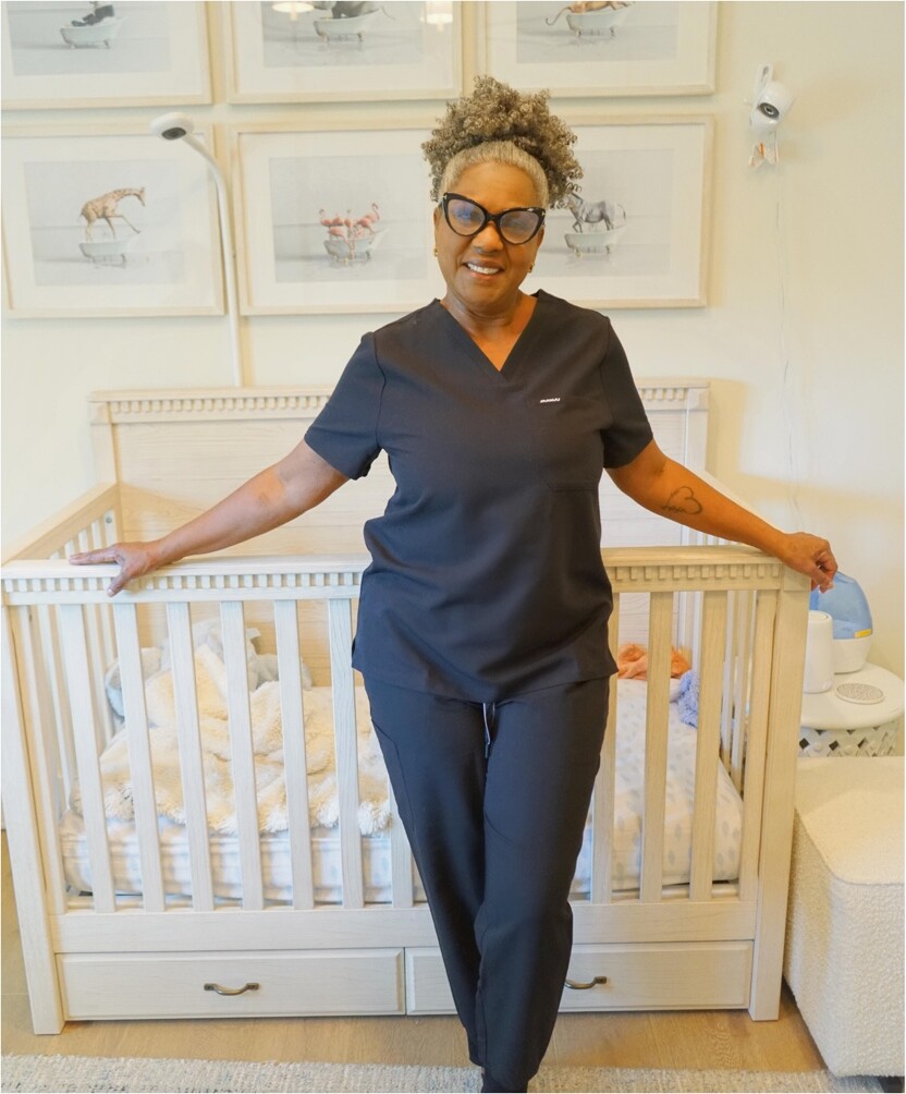 Stephaney in a thoughtfully prepared nursery